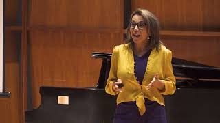 Laura Mattia on stage at TEDxStMichaels